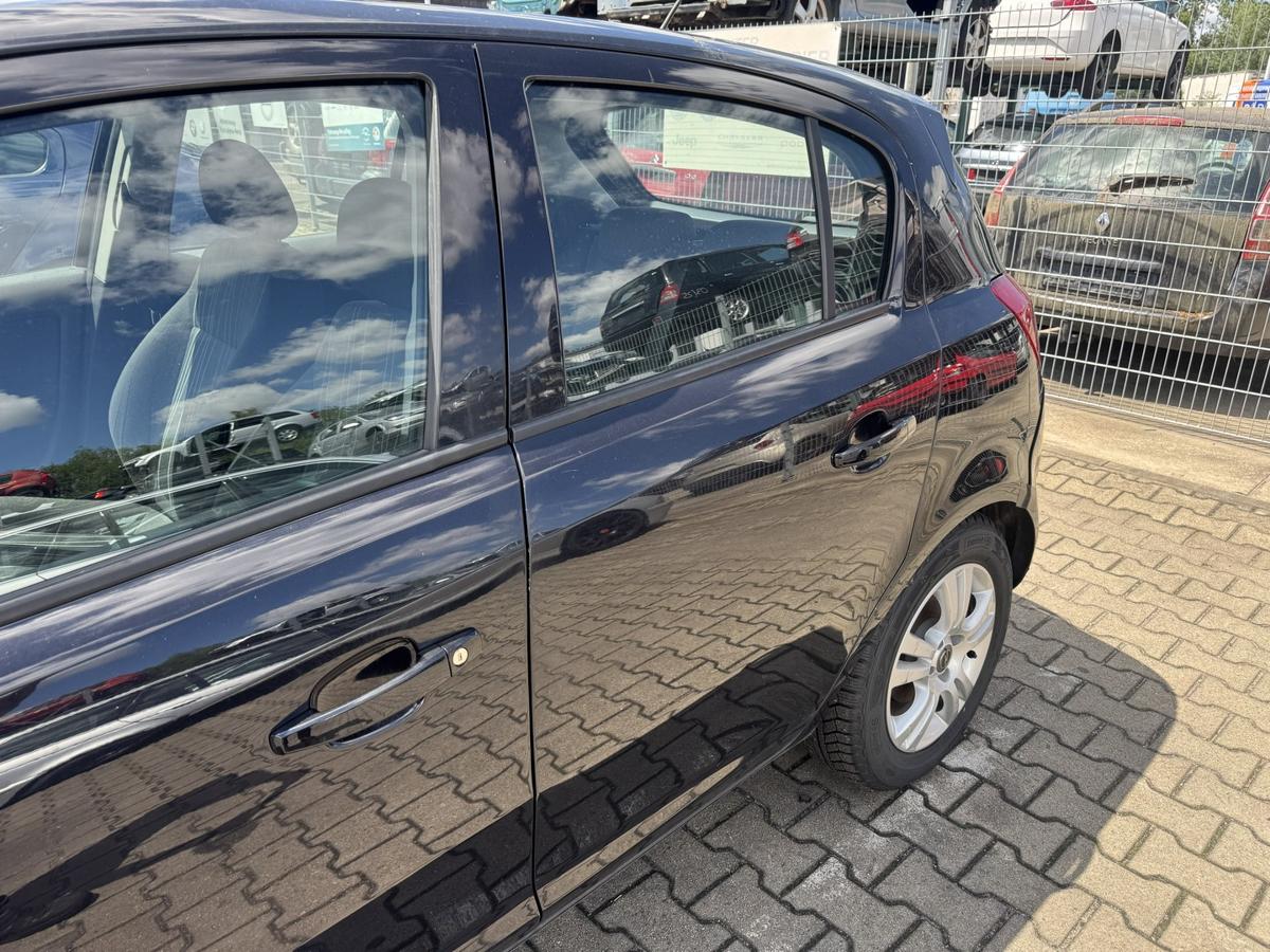 Opel Corsa D original T&uuml;r hinten links manueller Fensterheber Z20R Saphirschwarz Metallic Bj.2008